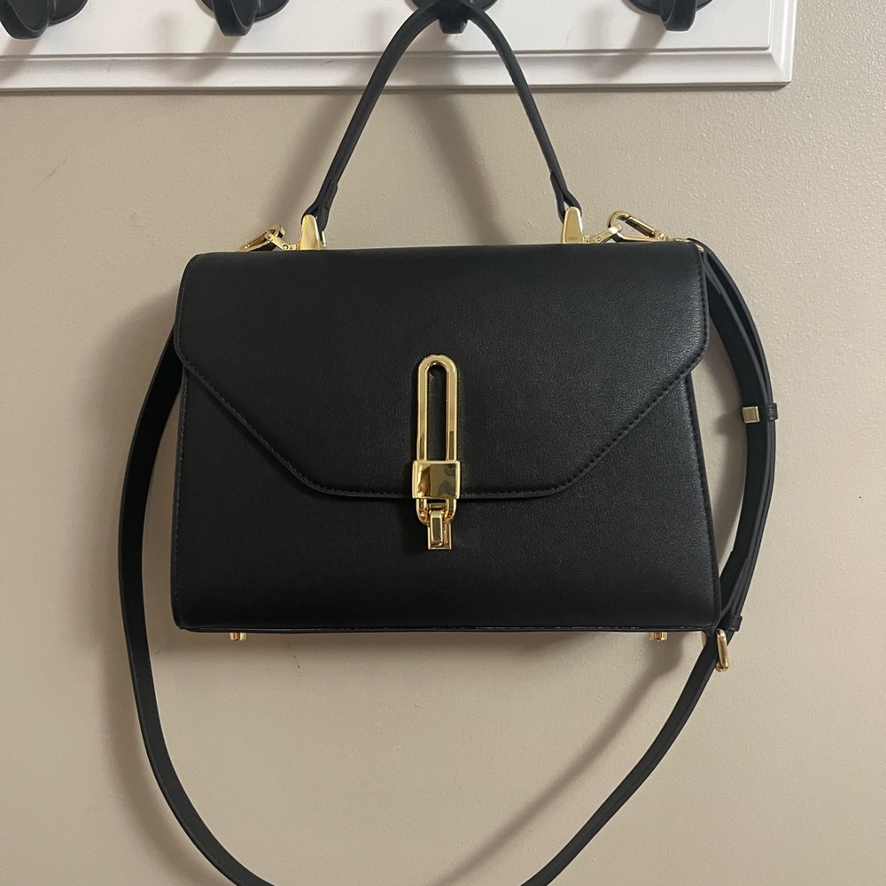 Elegant Black Handbag with Gold Accents